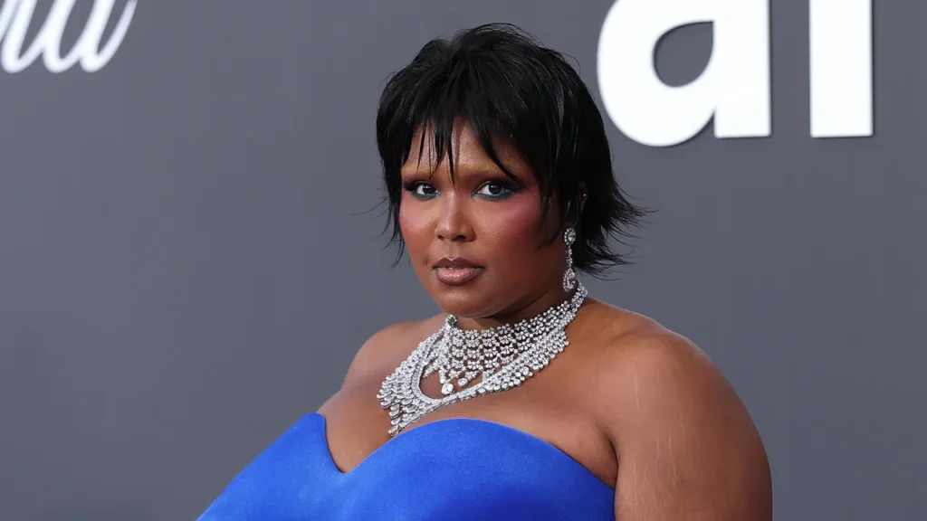 Lizzo Stuns in Bold Blue Gown at Cannes amfAR Gala