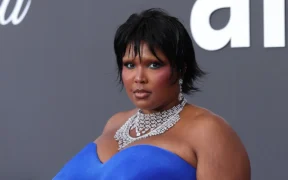 Lizzo Stuns in Bold Blue Gown at Cannes amfAR Gala